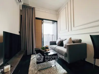 Chic modern living room with cozy sofa and balcony view