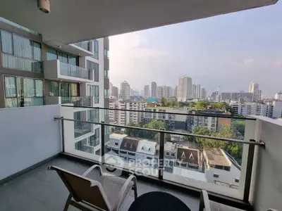 Spacious balcony with stunning city skyline view in modern apartment