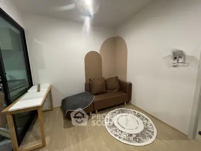 Cozy small living room with modern decor and unique wall design