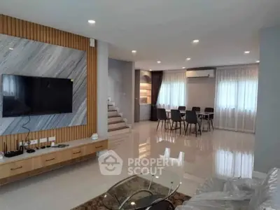 Spacious modern living room with dining area and stylish decor