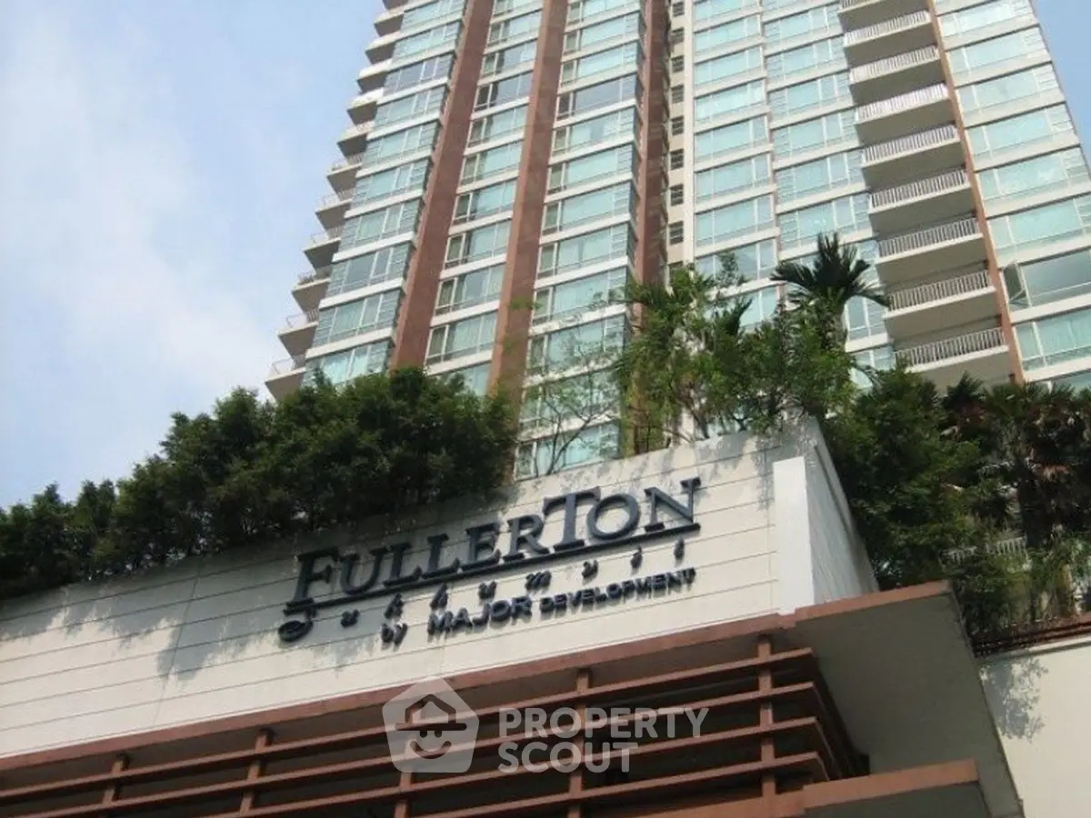 Stunning high-rise building with modern architecture and lush greenery at Fullerton Major Development.