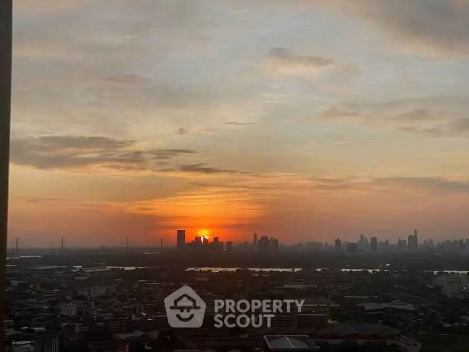 Stunning city skyline view at sunset with vibrant colors and serene atmosphere.