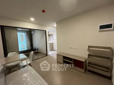 Modern living room with dining area and open kitchen in a stylish apartment