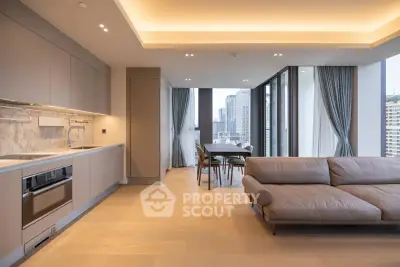 Luxurious open-plan living room with modern kitchen and stunning city view