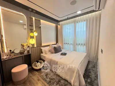 Cozy modern bedroom with elegant decor and soft lighting, featuring a plush bed and stylish furnishings.