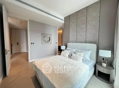 Luxurious bedroom with elegant decor and plush bedding in modern apartment