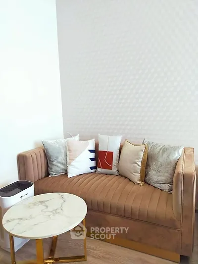 Stylish living room with modern sofa and chic marble table