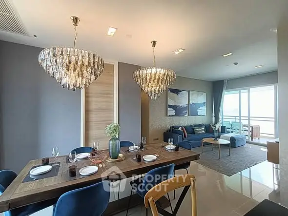 Luxurious living room with elegant chandeliers and modern decor