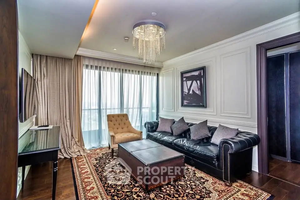 Luxurious living room with elegant chandelier and classic decor