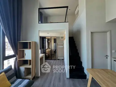 Modern loft apartment with high ceilings and stylish interior design