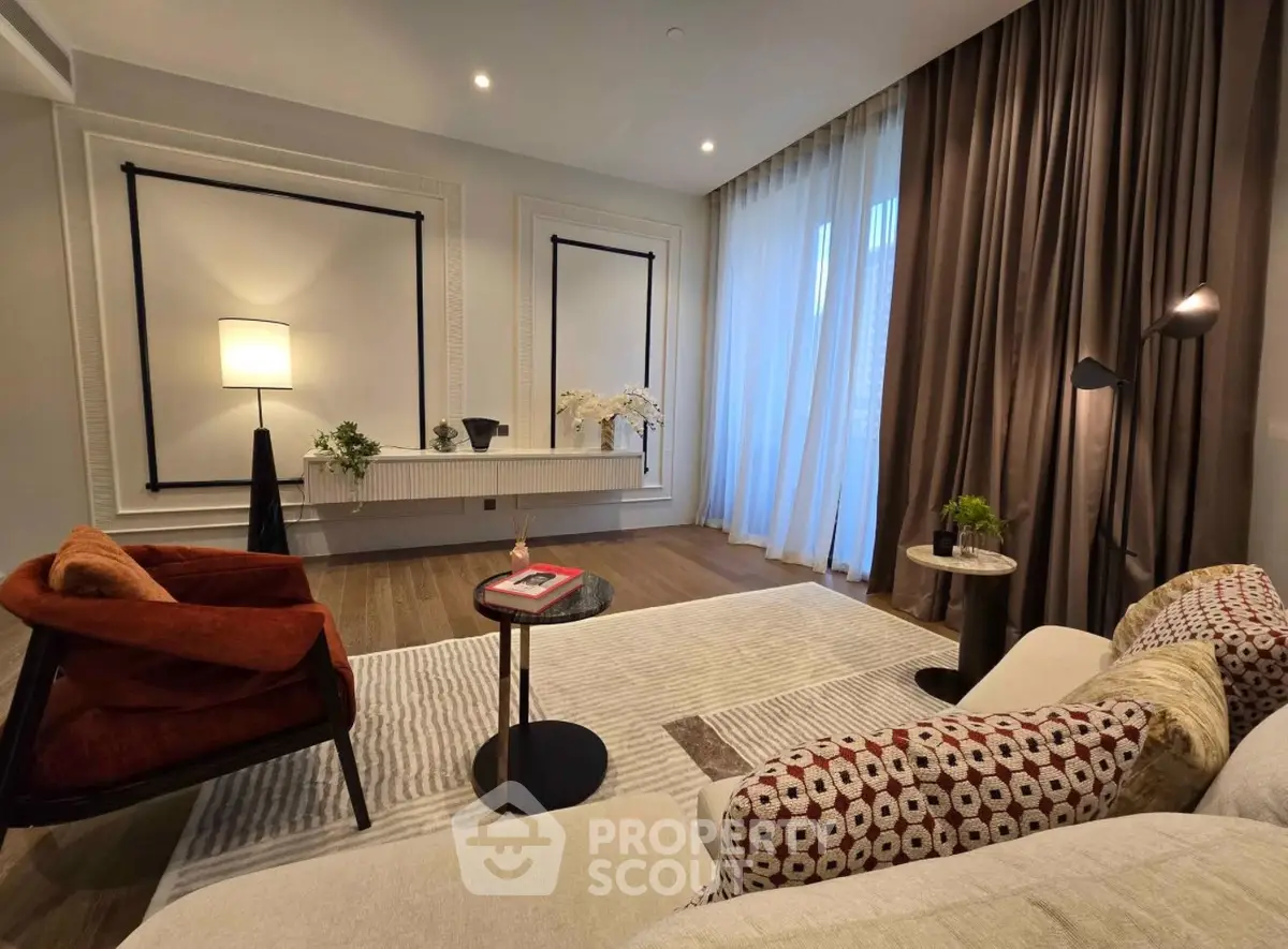 Elegant living room with modern decor and cozy seating area