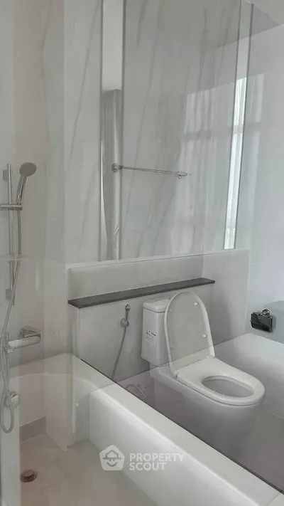Modern bathroom with sleek design and marble accents