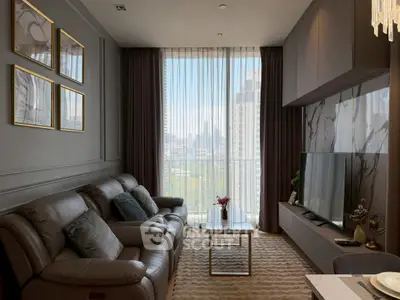 Luxurious living room with leather sofa and city view, perfect for modern urban living.
