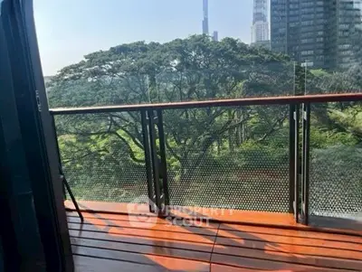 Spacious balcony with stunning green view in urban setting