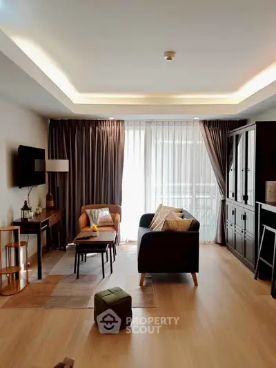 Spacious modern living room with elegant decor and natural light