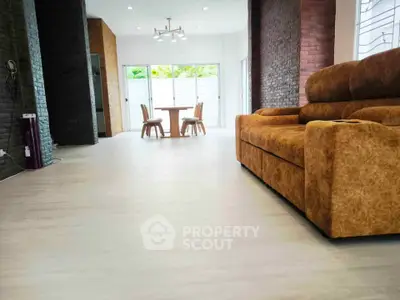 Spacious living room with modern furniture and natural light