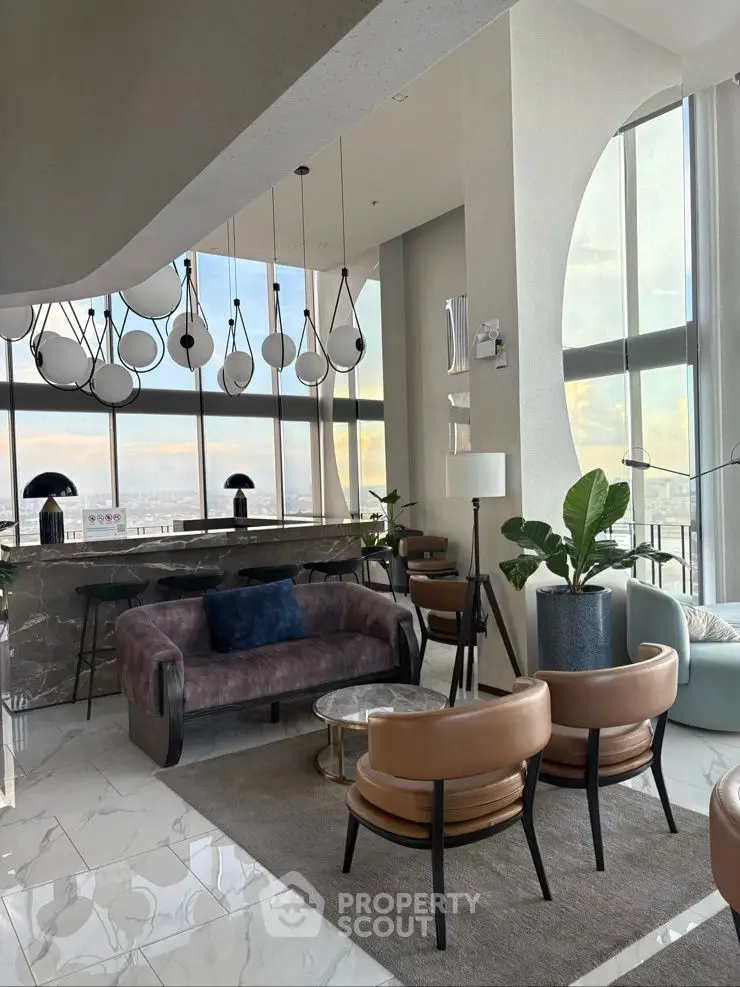 Luxurious modern living room with high ceilings and panoramic windows.