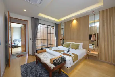 Luxurious modern bedroom with elegant decor and natural lighting
