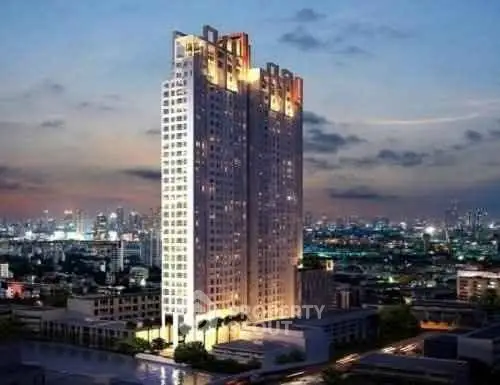 Stunning high-rise building with cityscape view at dusk, showcasing modern architecture and urban living.