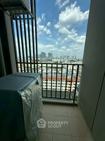 Charming balcony with cityscape view, perfect for relaxation and enjoying urban skyline.