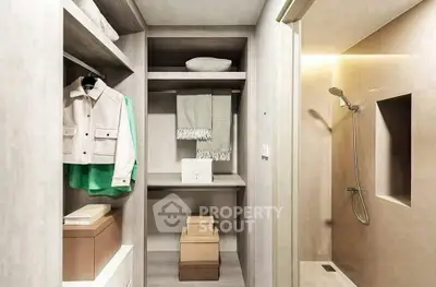 Modern walk-in closet with sleek shower area, perfect for luxury living.
