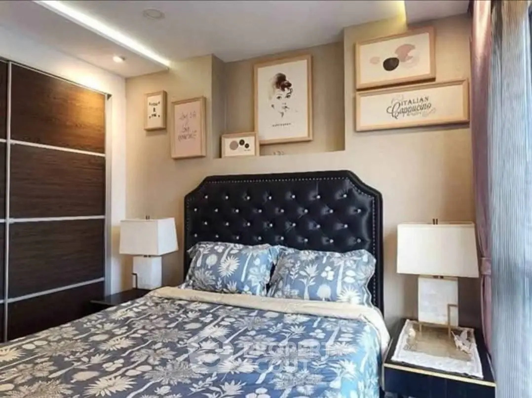 Luxurious bedroom with elegant decor and stylish artwork, featuring a plush bed and modern lighting.