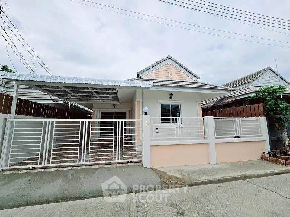 Charming single-story house with gated entrance and modern design