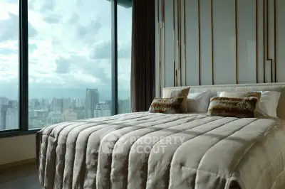 Luxurious bedroom with stunning city view and elegant decor