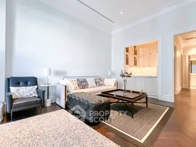 Elegant living room with modern furniture and stylish decor in a luxury apartment.