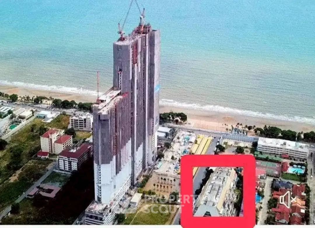 Stunning beachfront high-rise under construction with ocean views