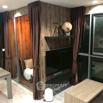 Modern living room with wooden accents and large windows, featuring a cozy balcony area.