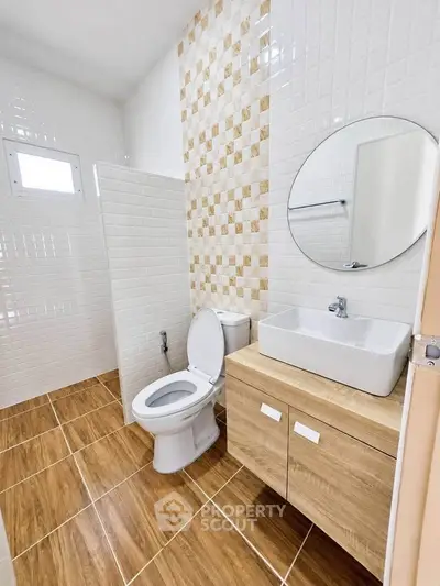 Modern bathroom with stylish tiles and sleek fixtures