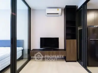 Modern apartment interior with sleek design and glass partitions