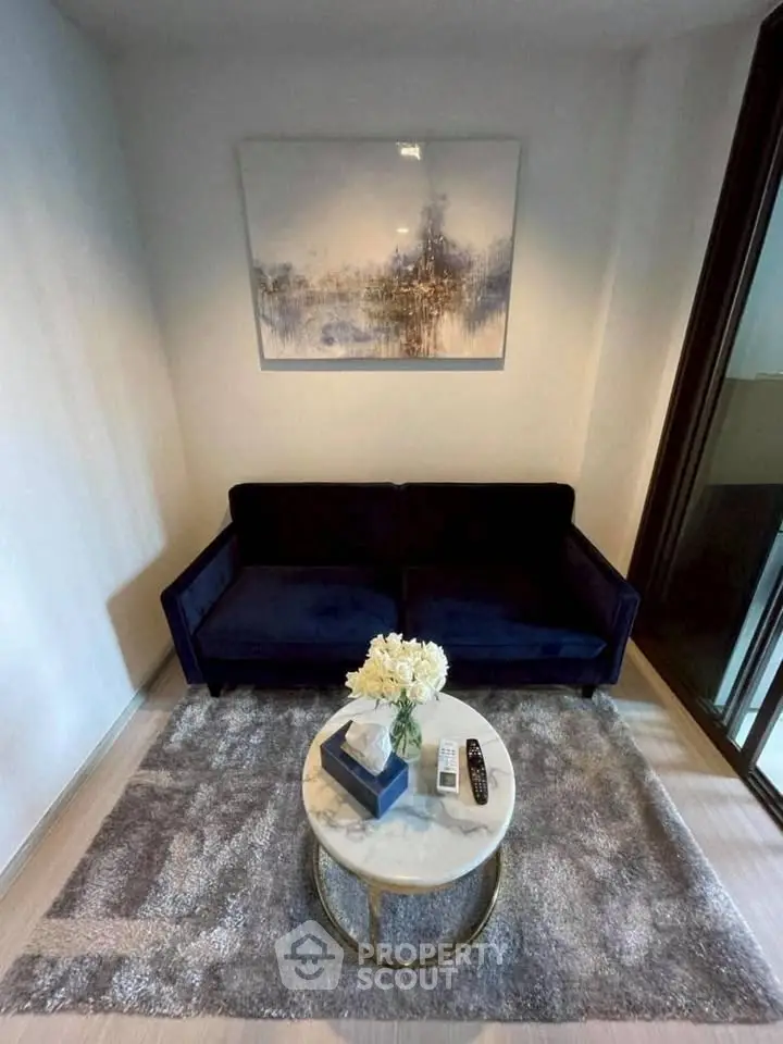 Cozy living room with elegant decor and plush sofa