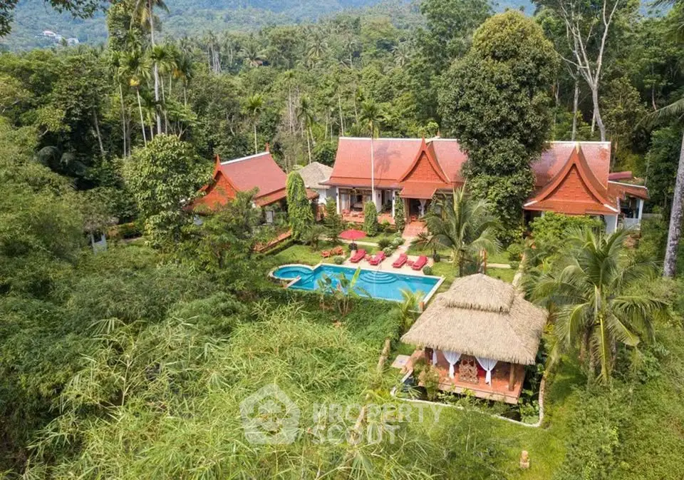 Luxurious tropical villa with private pool and lush garden in serene setting