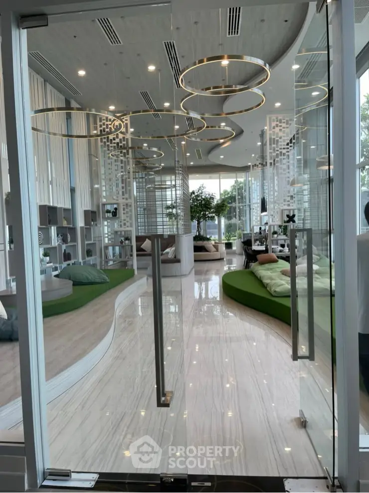 Luxurious modern lobby with stylish decor and elegant lighting, perfect for upscale living.