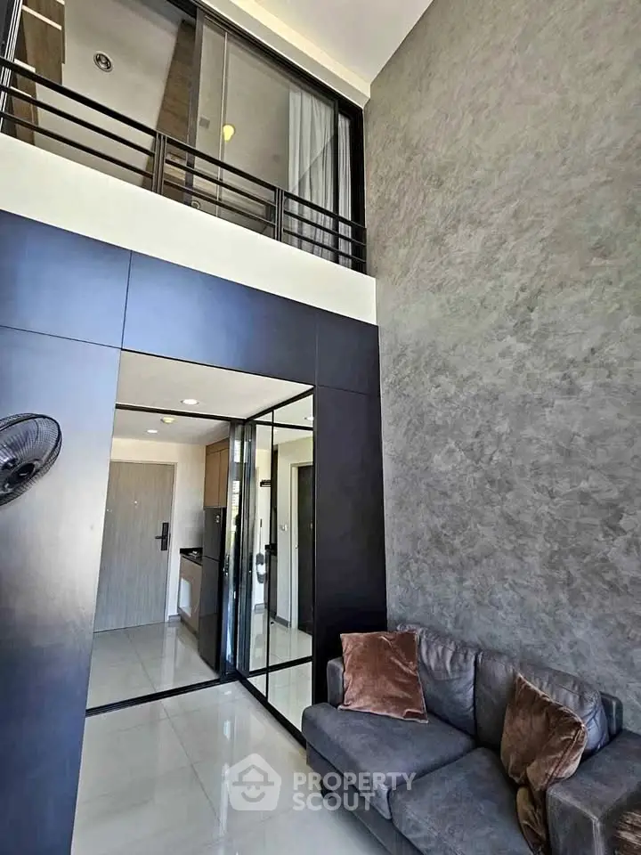 Modern loft apartment with high ceilings and sleek interior design