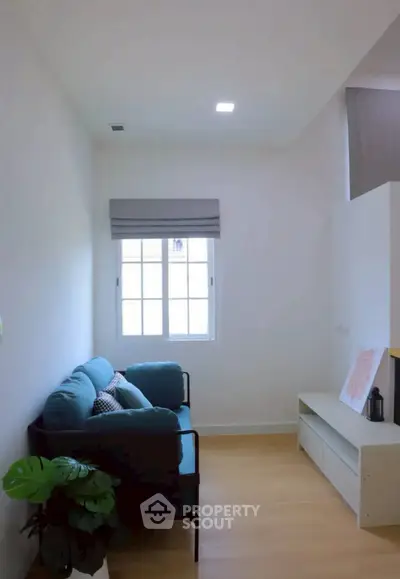 Cozy living room with natural light and modern decor