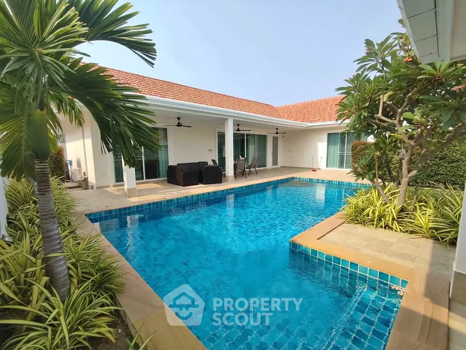 Luxurious villa with private pool and lush garden, perfect for relaxation and entertainment.