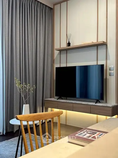 Modern living room with sleek TV setup and elegant decor