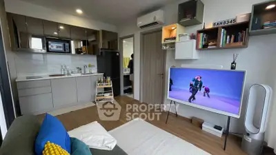 Modern living room with open kitchen and stylish decor