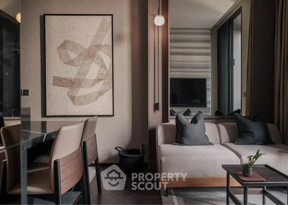 Modern living room with stylish decor and cozy seating area, perfect for relaxation and entertainment.