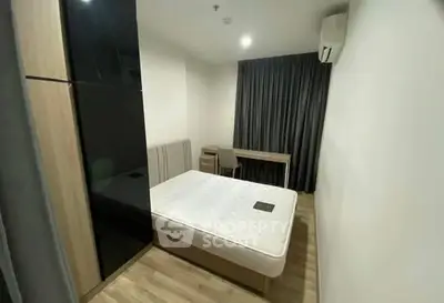 Modern minimalist bedroom with sleek furniture and cozy ambiance