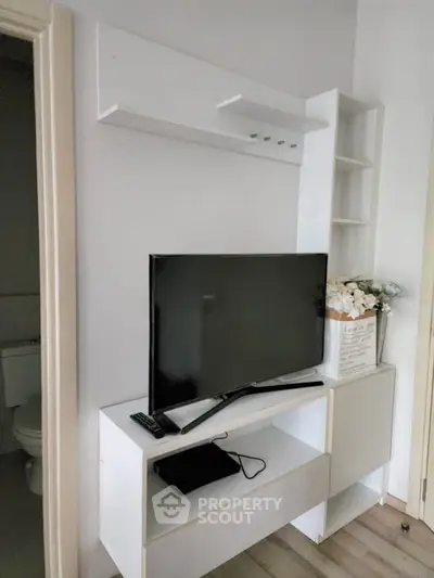 Modern living room with sleek TV unit and stylish decor