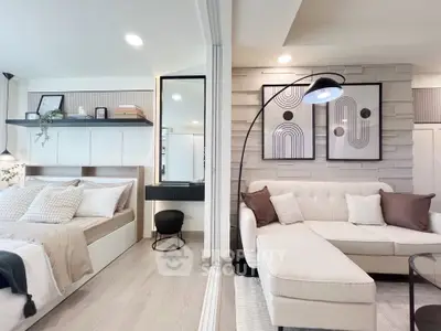 Modern studio apartment with stylish decor and cozy living area