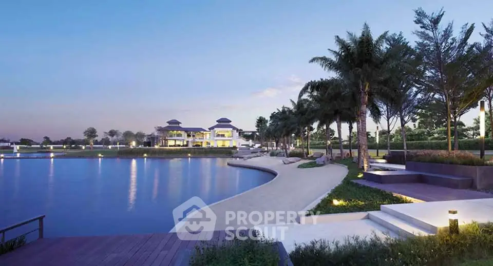 Luxurious waterfront property with stunning landscaped gardens and serene lake view.