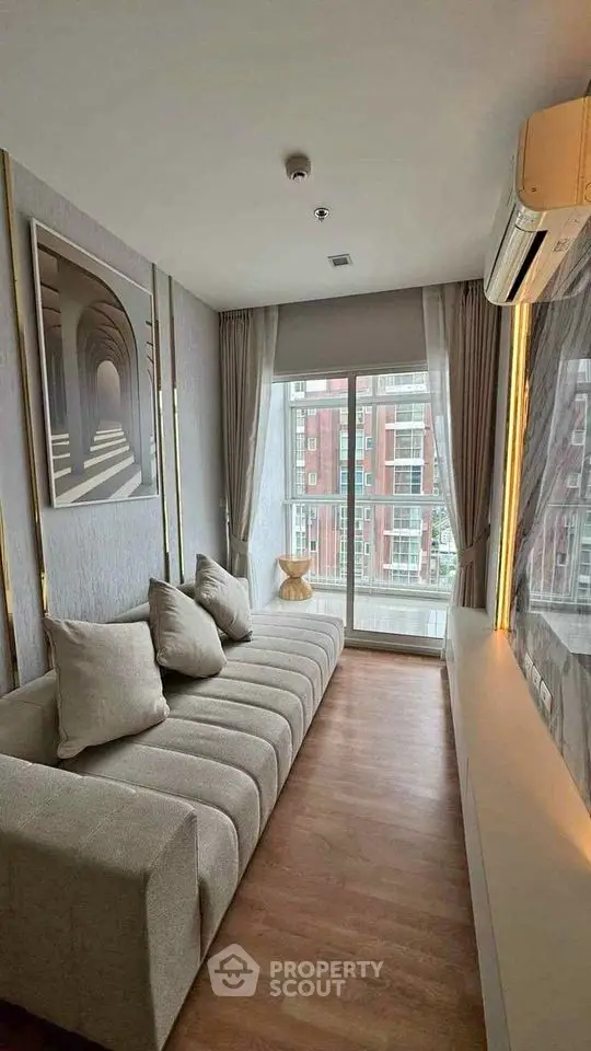 Stylish modern living room with large window and elegant decor