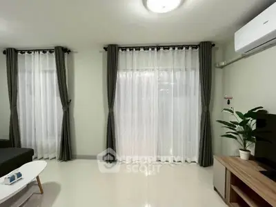 Modern living room with elegant curtains and air conditioning