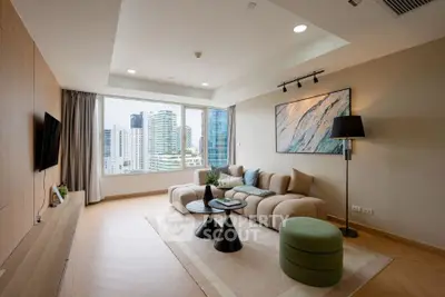 Modern living room with city view, stylish furniture, and elegant decor.