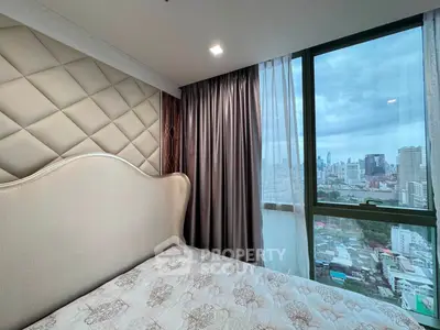 Luxurious bedroom with stunning city view and elegant decor